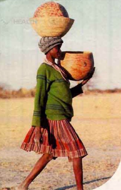 Girl Carrying Baskets